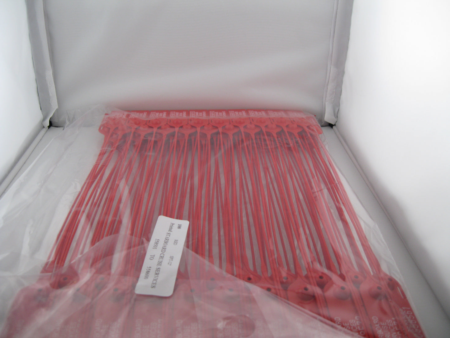 PLASTIC DOOR SEALS (100 Pcs of seals per pack)